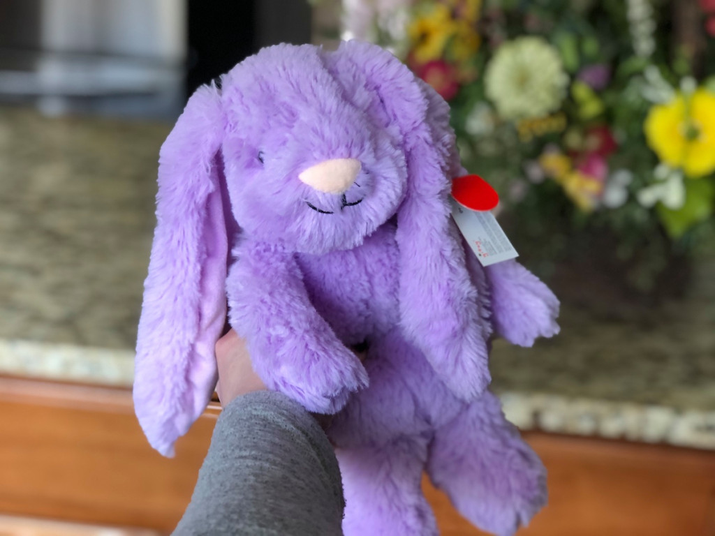hand holding a plush bunny
